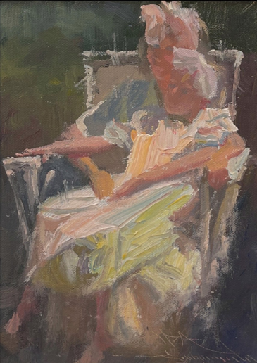 Two Girls in Wicker Chair